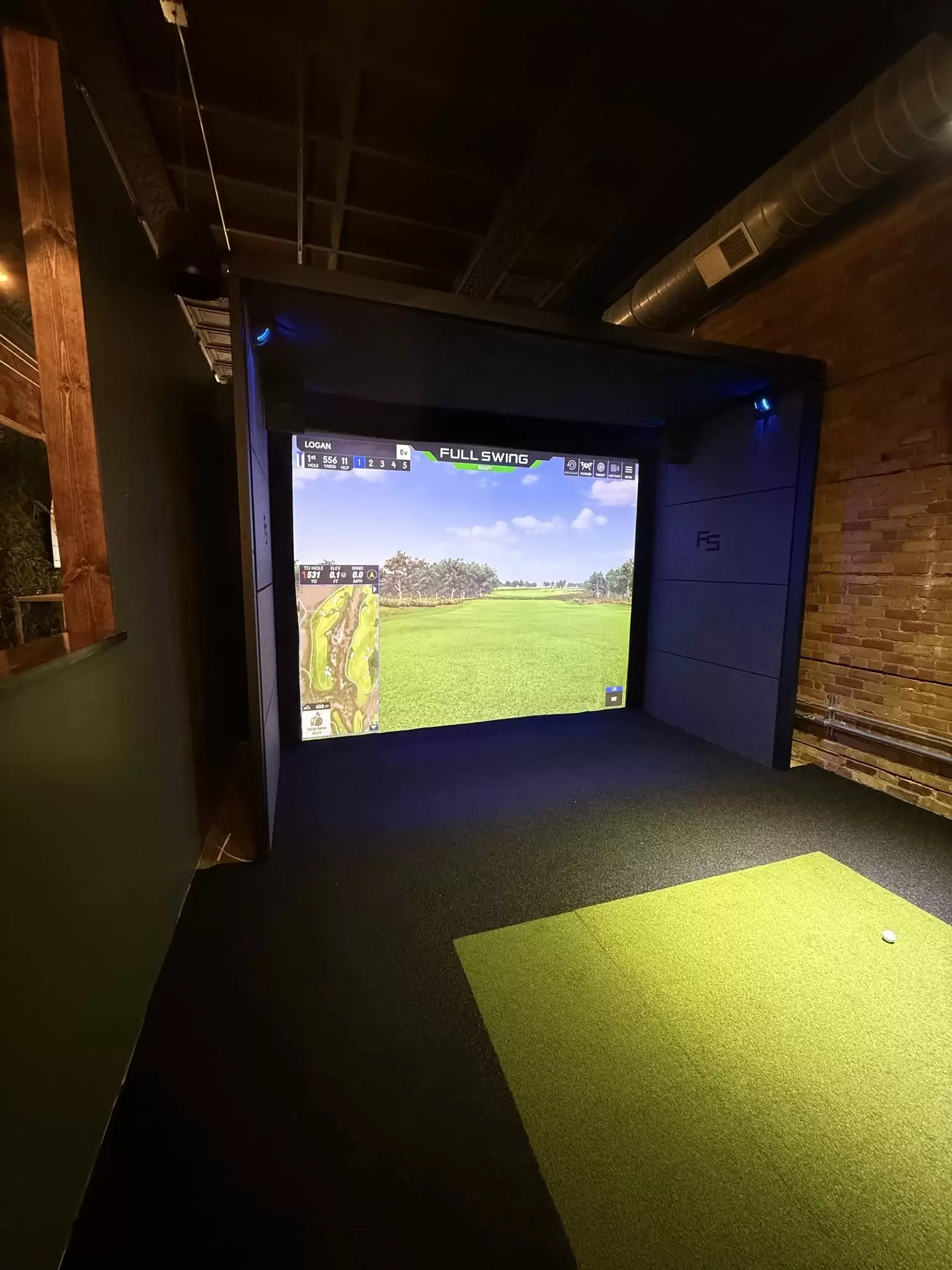 A Full Swing golf simulator bay at Tower Avenue Country Club in Superior, WI